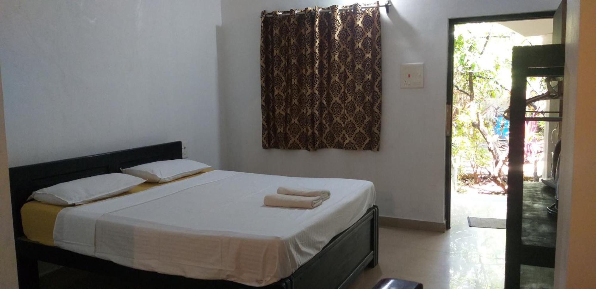 God'S Gift Morjim Hotel Quarto foto
